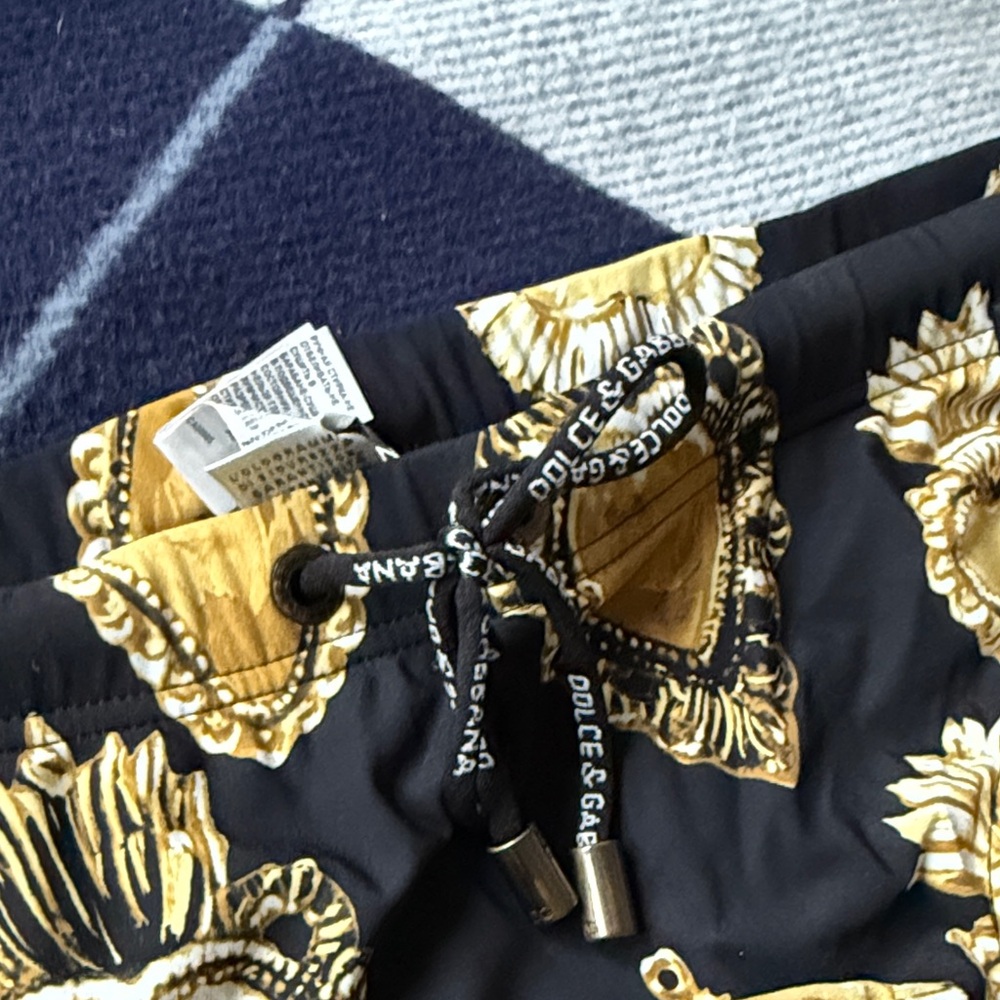 Dolce & Gabbana Black Swim Briefs with Gold Sacred Heart Motif - Picture 2 of 5